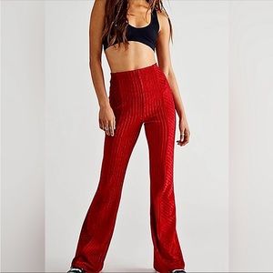 Red free people stretch flare pants